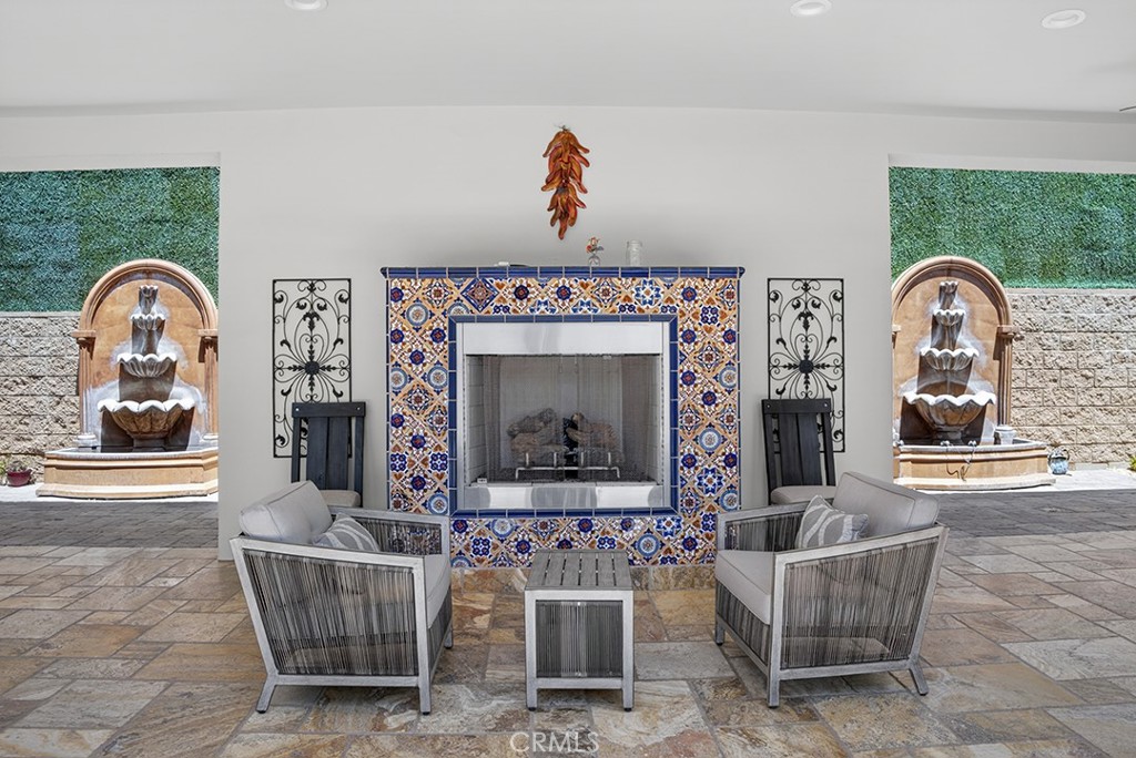 19843 Split Oak Road Chatsworth, CA 91311 - Photo 64 of 75 a living room with furniture and a fireplace