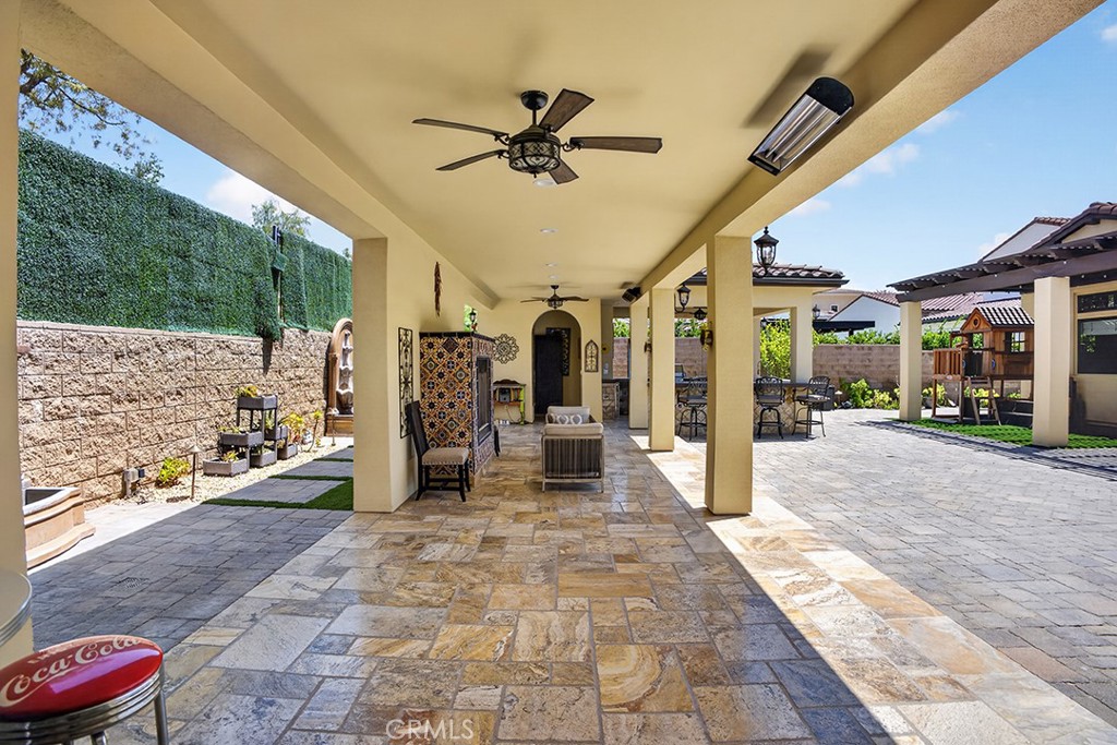 19843 Split Oak Road Chatsworth, CA 91311 - Photo 65 of 75 a view of a porch with a patio