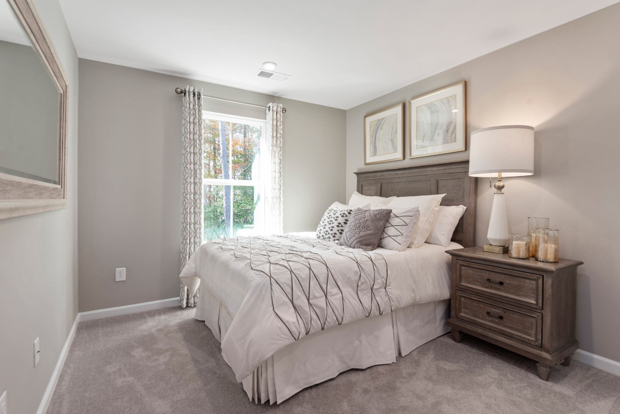 124 Keelon Gap Road, Unit 112B Spring Hill, TN 37174 - Photo 2 of 10 a bedroom with a bed and a lamp