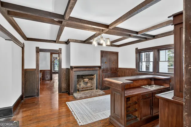 a view of a livingroom with furniture and fireplace