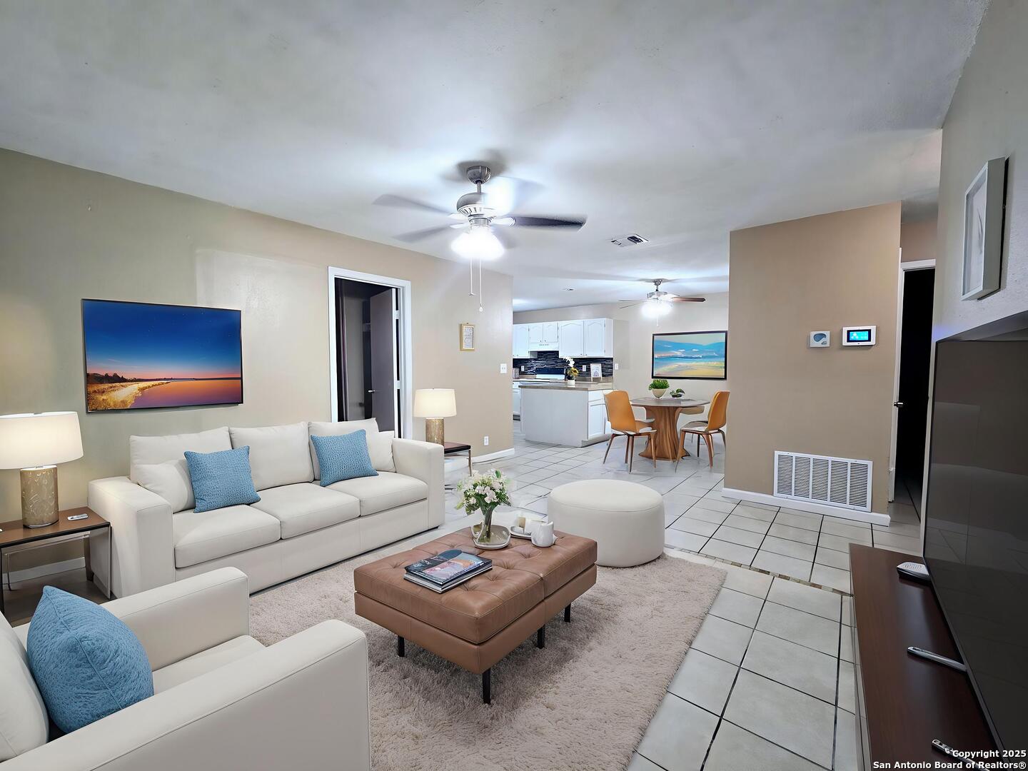 6901 Oldham Drive San Antonio, TX 78239 - Photo 1 of 1 a living room with furniture and a flat screen tv