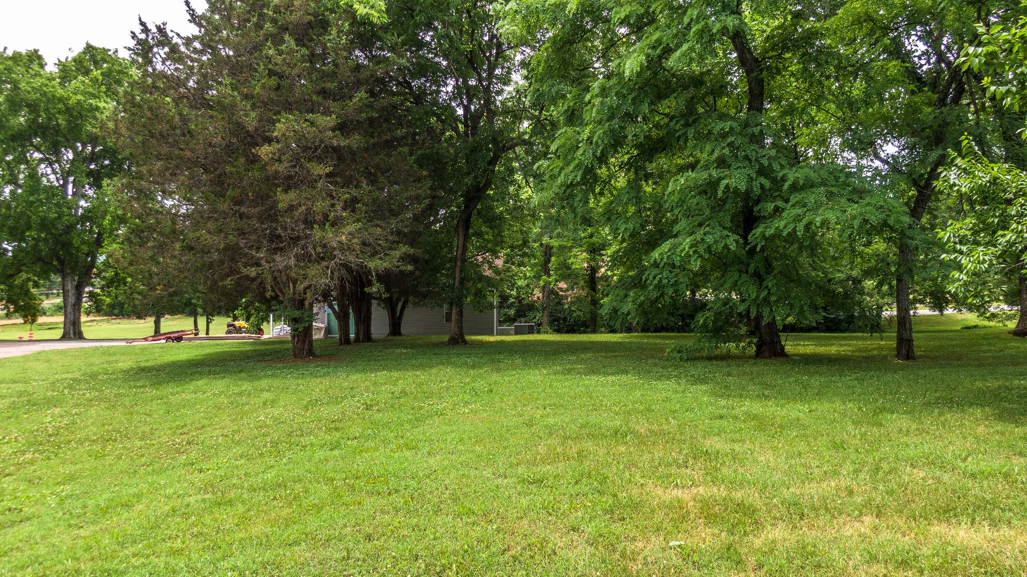 1219 Franklin Road Brentwood, TN 37027 - Photo 13 of 25 a view of a trees in a yard