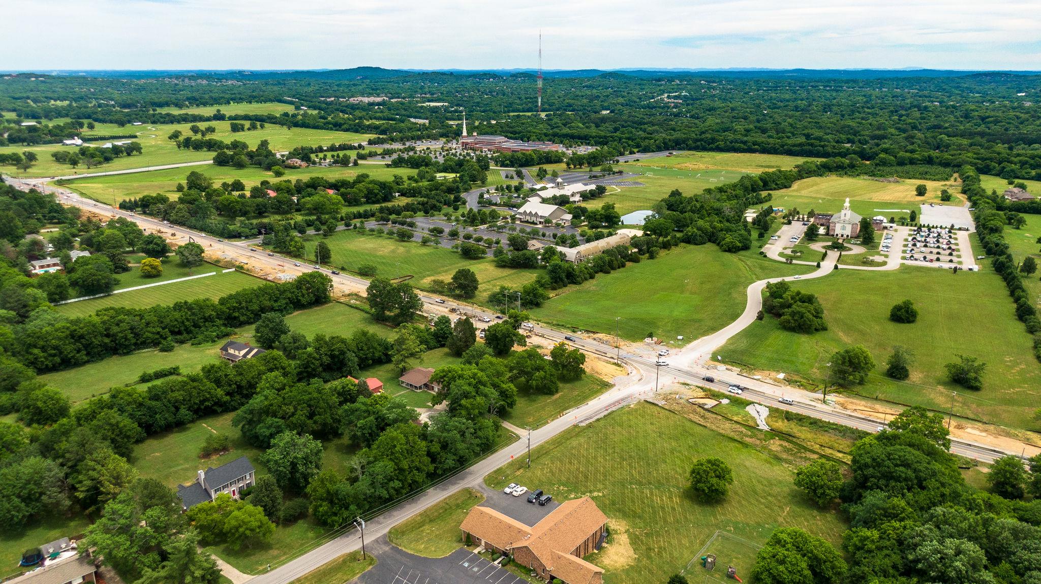 1219 Franklin Road Brentwood, TN 37027 - Photo 19 of 25 an aerial view of residential houses with outdoor space