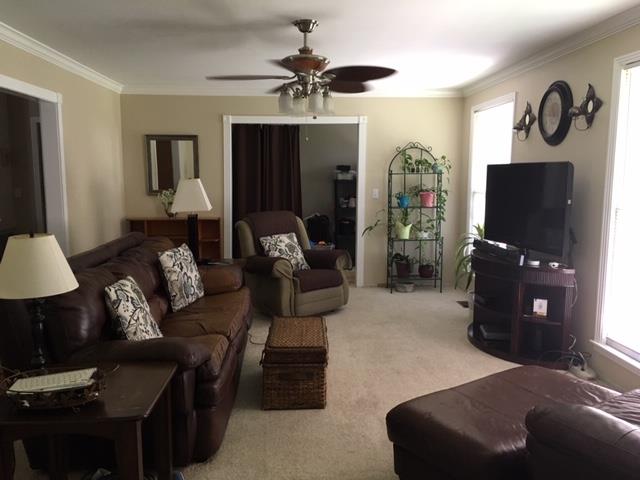 1219 Franklin Road Brentwood, TN 37027 - Photo 22 of 25 a living room with furniture and a flat screen tv