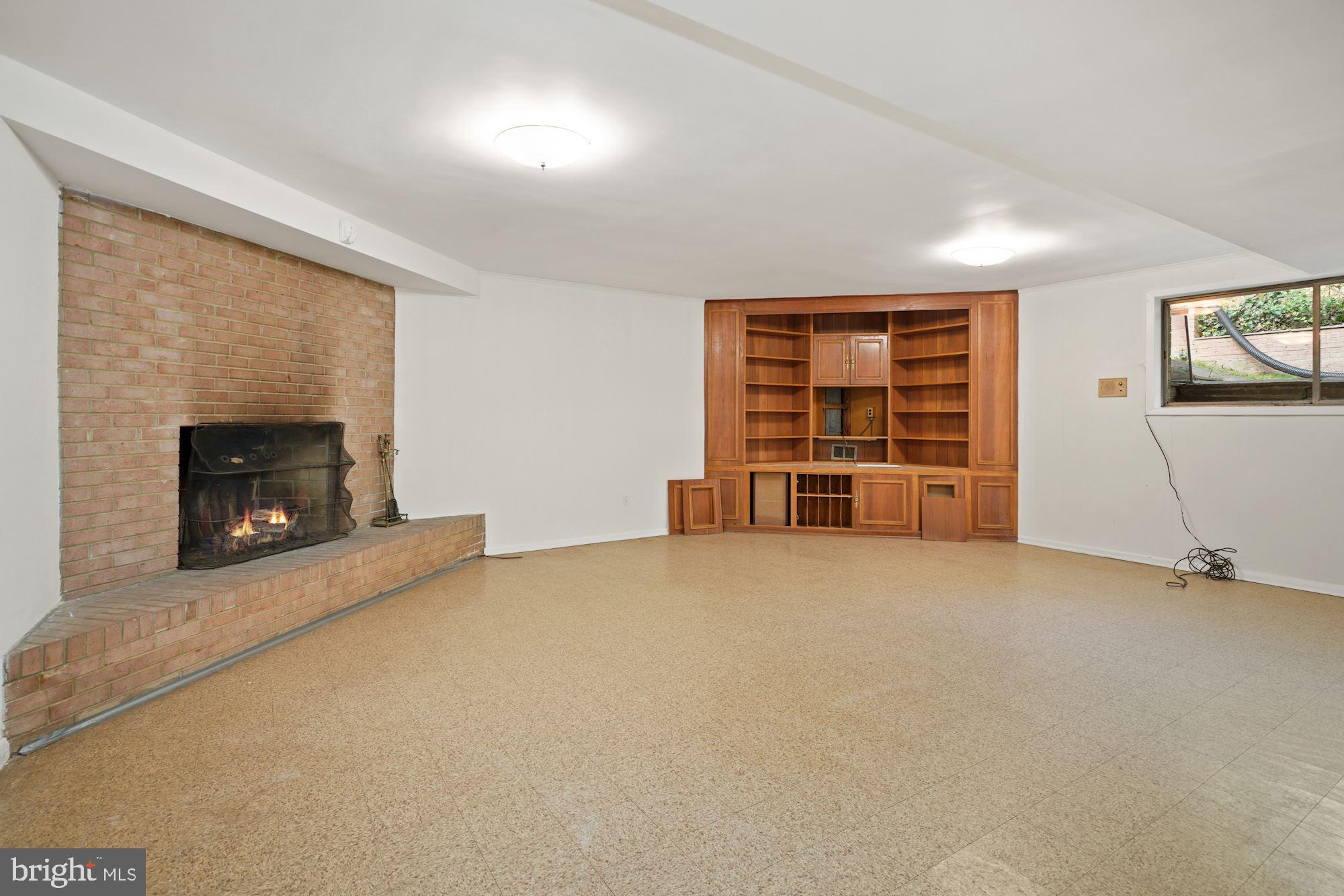 4402 29th Street Northwest Washington, DC 20008 - Photo 23 of 33 Recreation Room fireplace