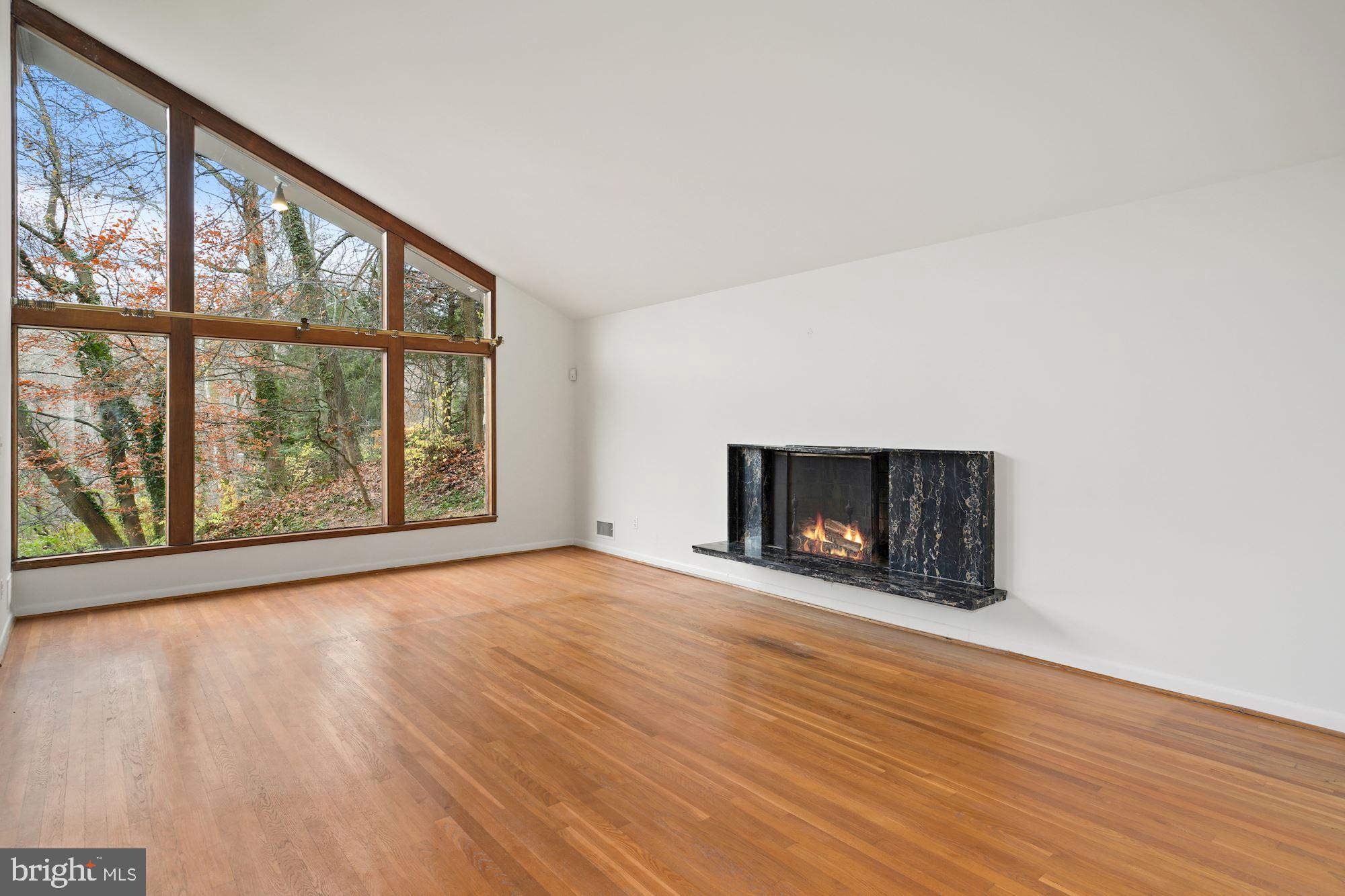 4402 29th Street Northwest Washington, DC 20008 - Photo 5 of 33 Living Room with soaring ceilings