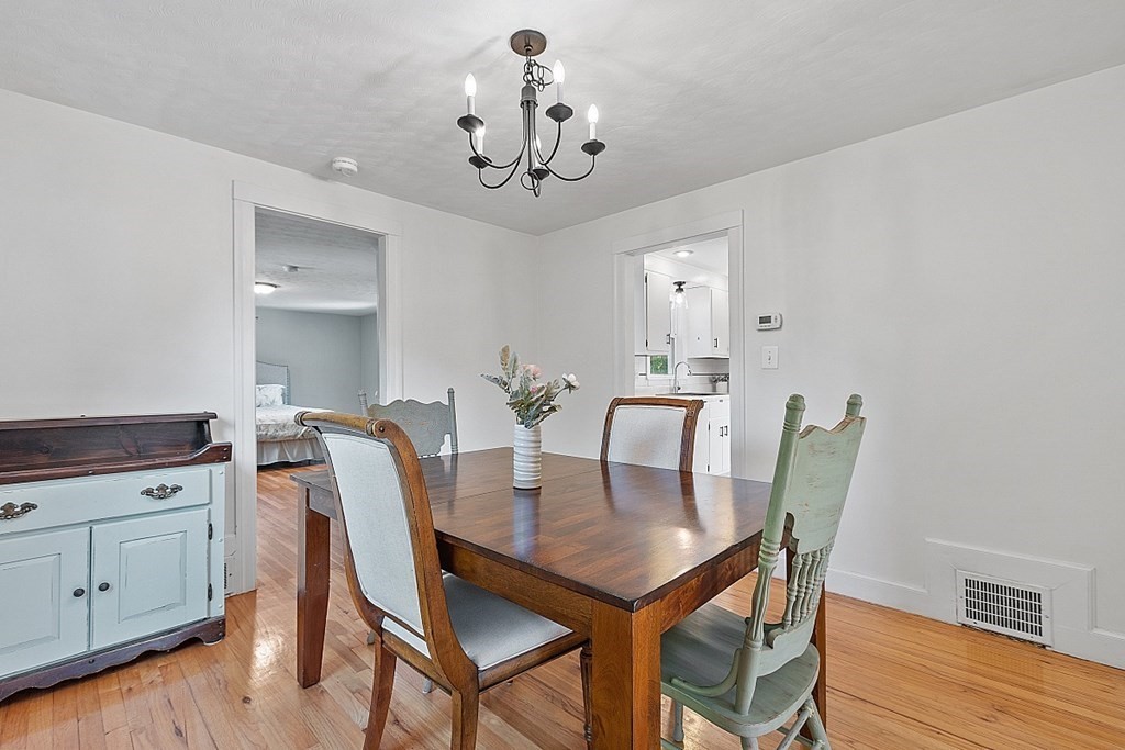 6 Maxdale Road Worcester, MA 01602 - Photo 8 of 42 a view of a dining room with furniture and wooden floor