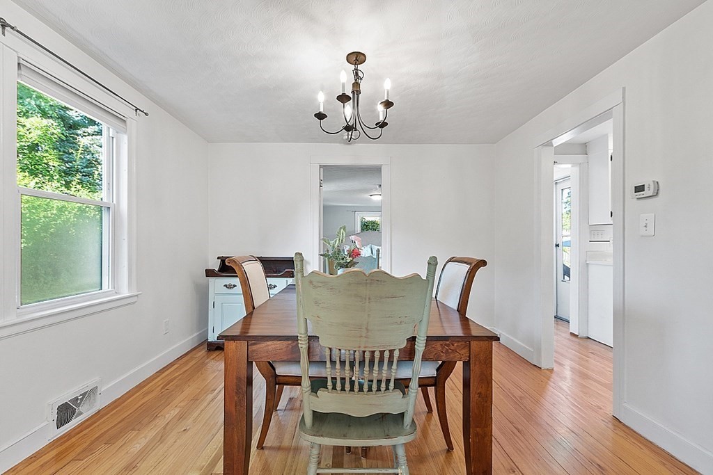 6 Maxdale Road Worcester, MA 01602 - Photo 9 of 42 a view of a dining room with furniture window and wooden floor