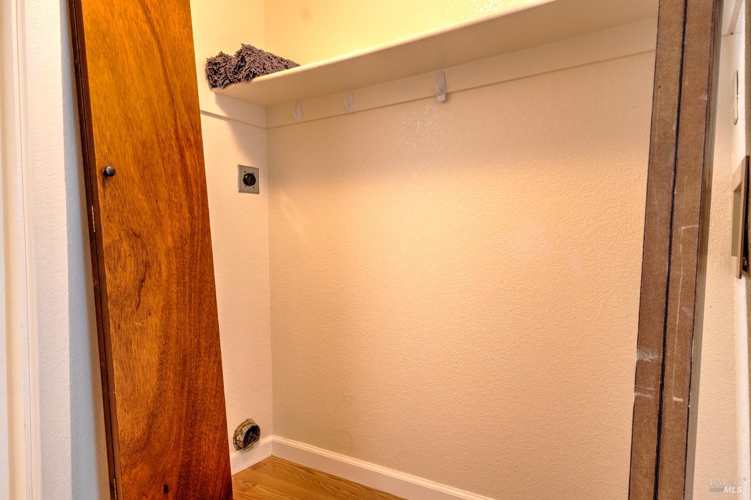 539 Norlee Street Sebastopol, CA 95472 - Photo 18 of 26 Indoor laundry closet with 220 plug and electric dryer vent to outside.