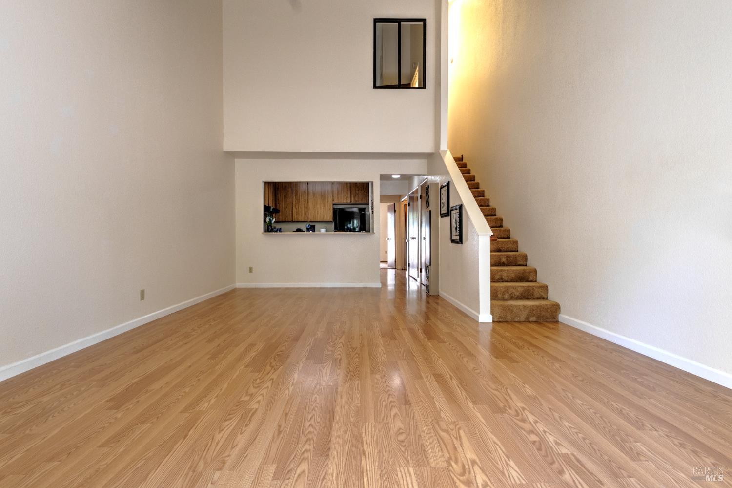539 Norlee Street Sebastopol, CA 95472 - Photo 6 of 26 Light and bright front living room area with skylight over stairs.