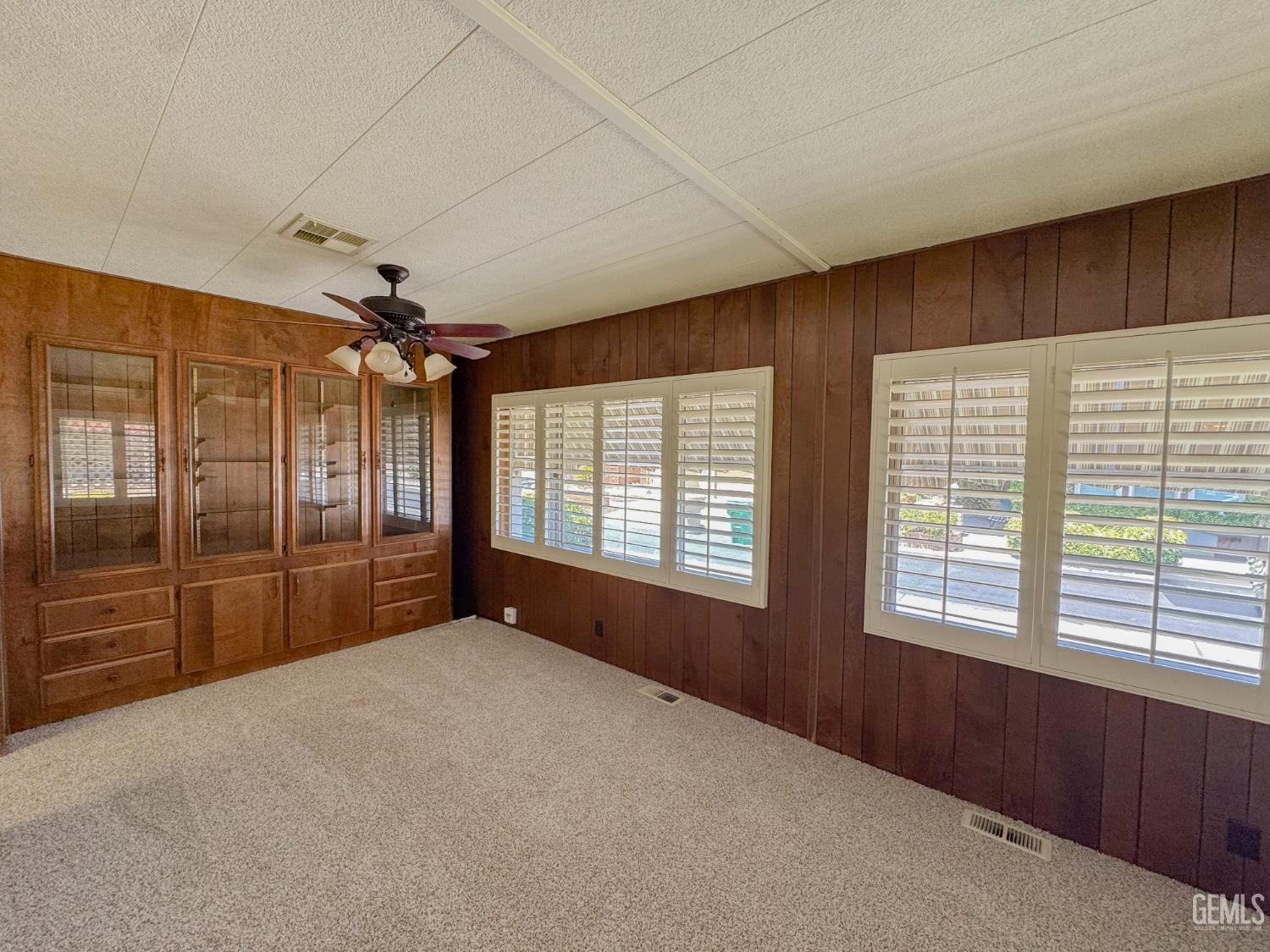 Undisclosed Address Bakersfield, CA 93306 - Photo 16 of 41 a view of an empty room with a window