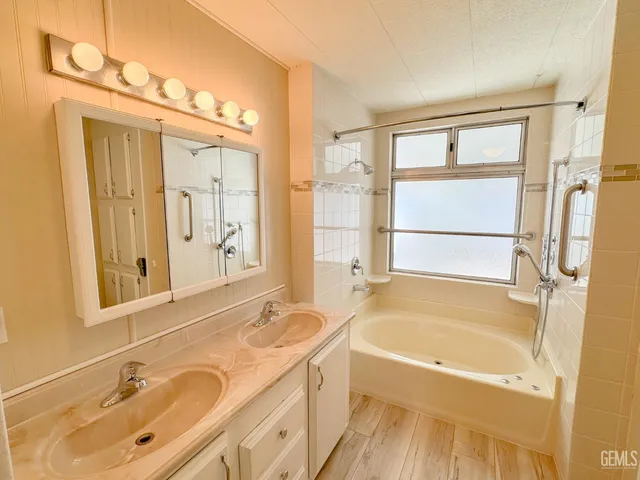 a white toilet sitting next to a shower