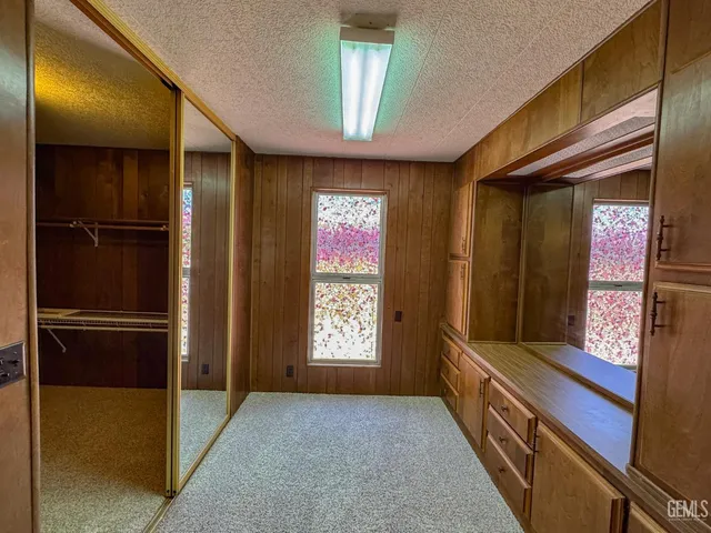 a view of a room with racks on the wall