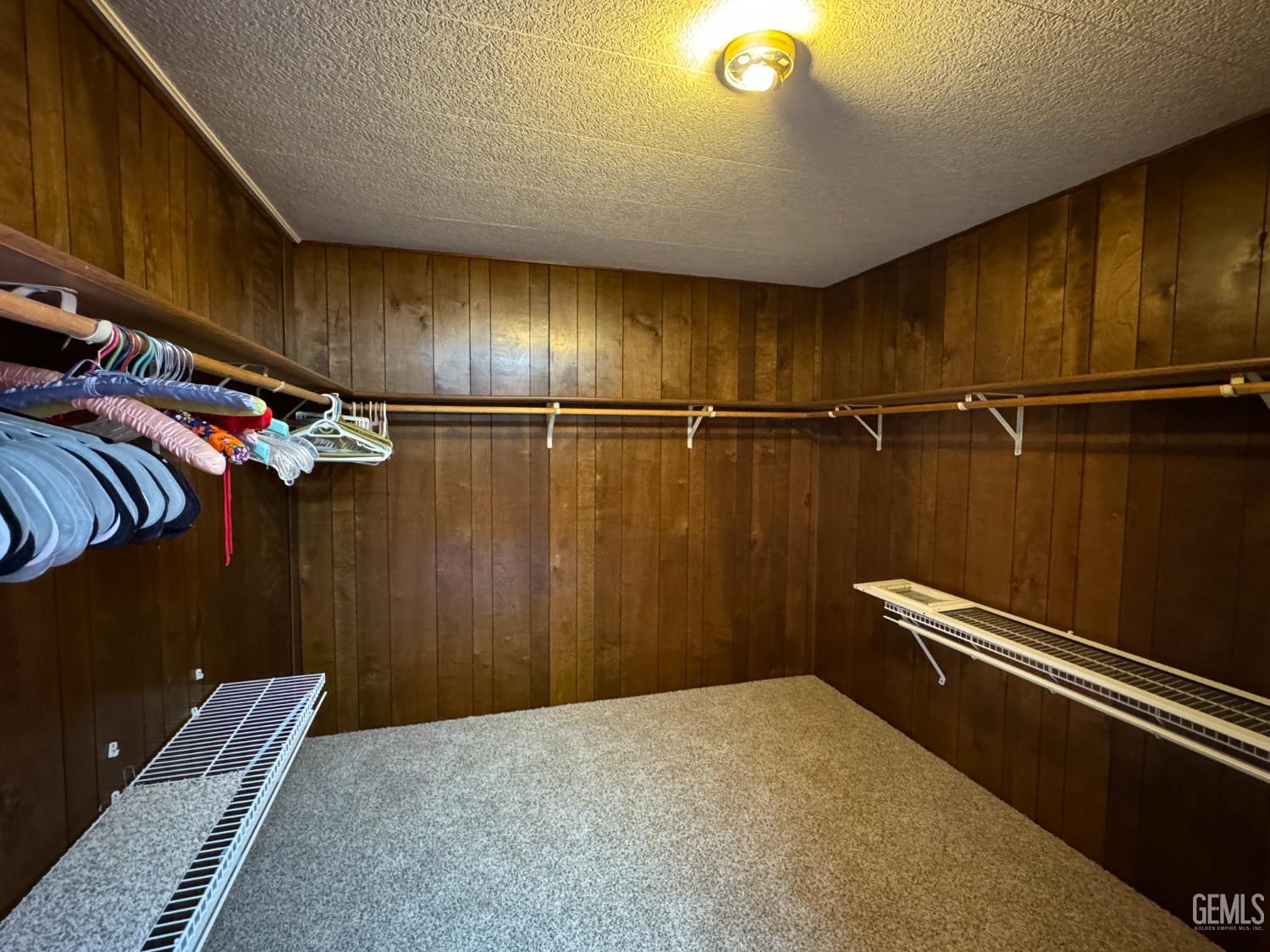 Undisclosed Address Bakersfield, CA 93306 - Photo 34 of 41 a view of a room with racks on the wall