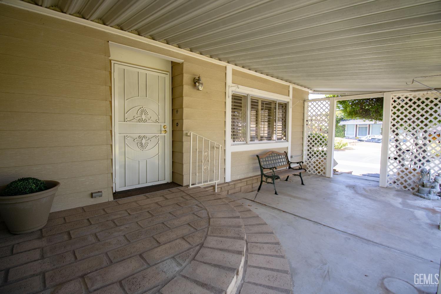 Undisclosed Address Bakersfield, CA 93306 - Photo 5 of 41 a view of a porch with furniture