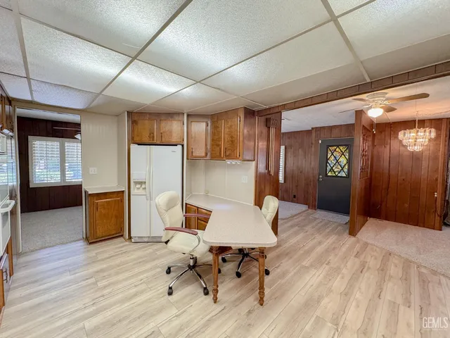 a workspace with furniture and wooden floor