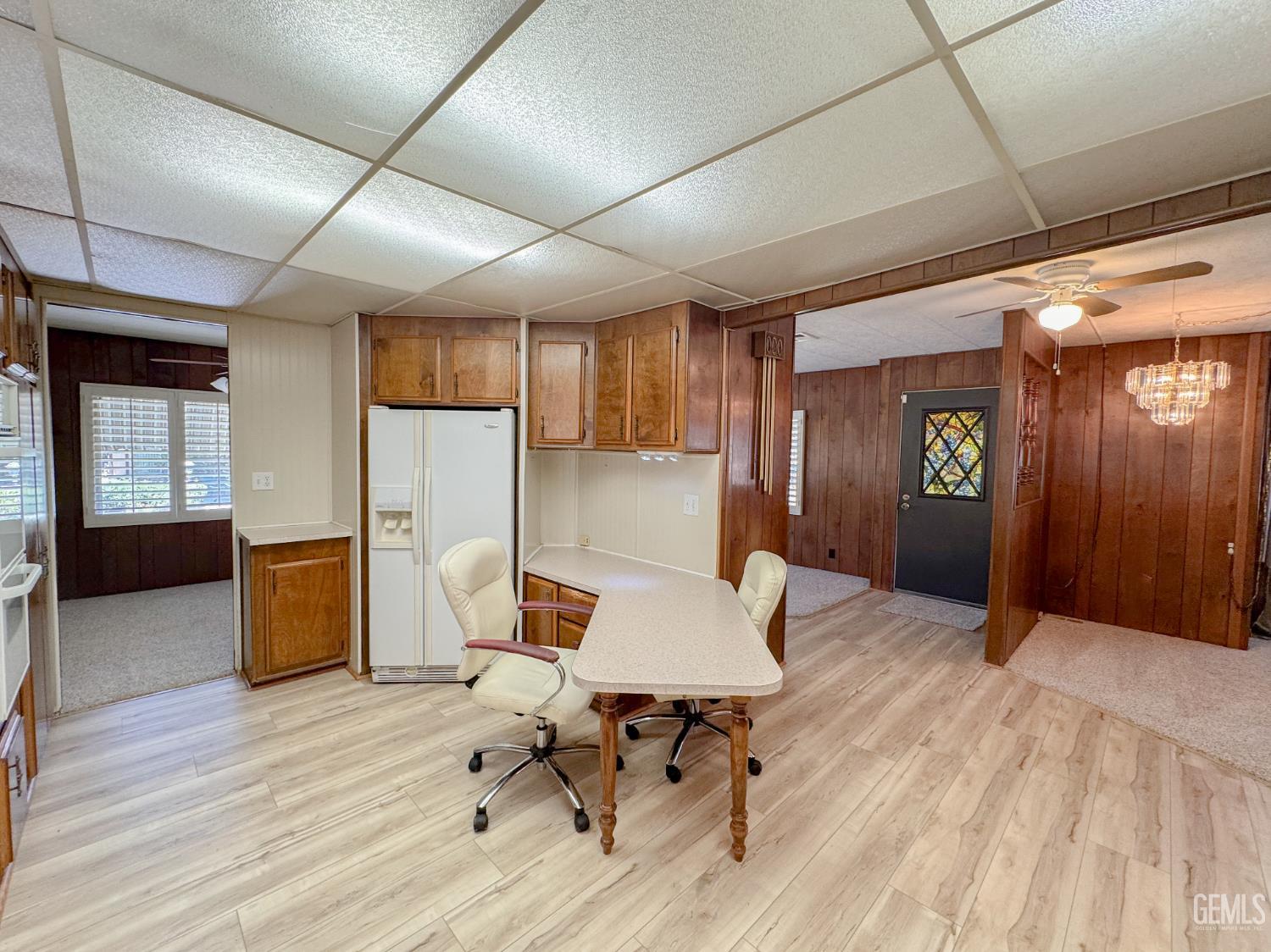 Undisclosed Address Bakersfield, CA 93306 - Photo 8 of 41 a workspace with furniture and wooden floor