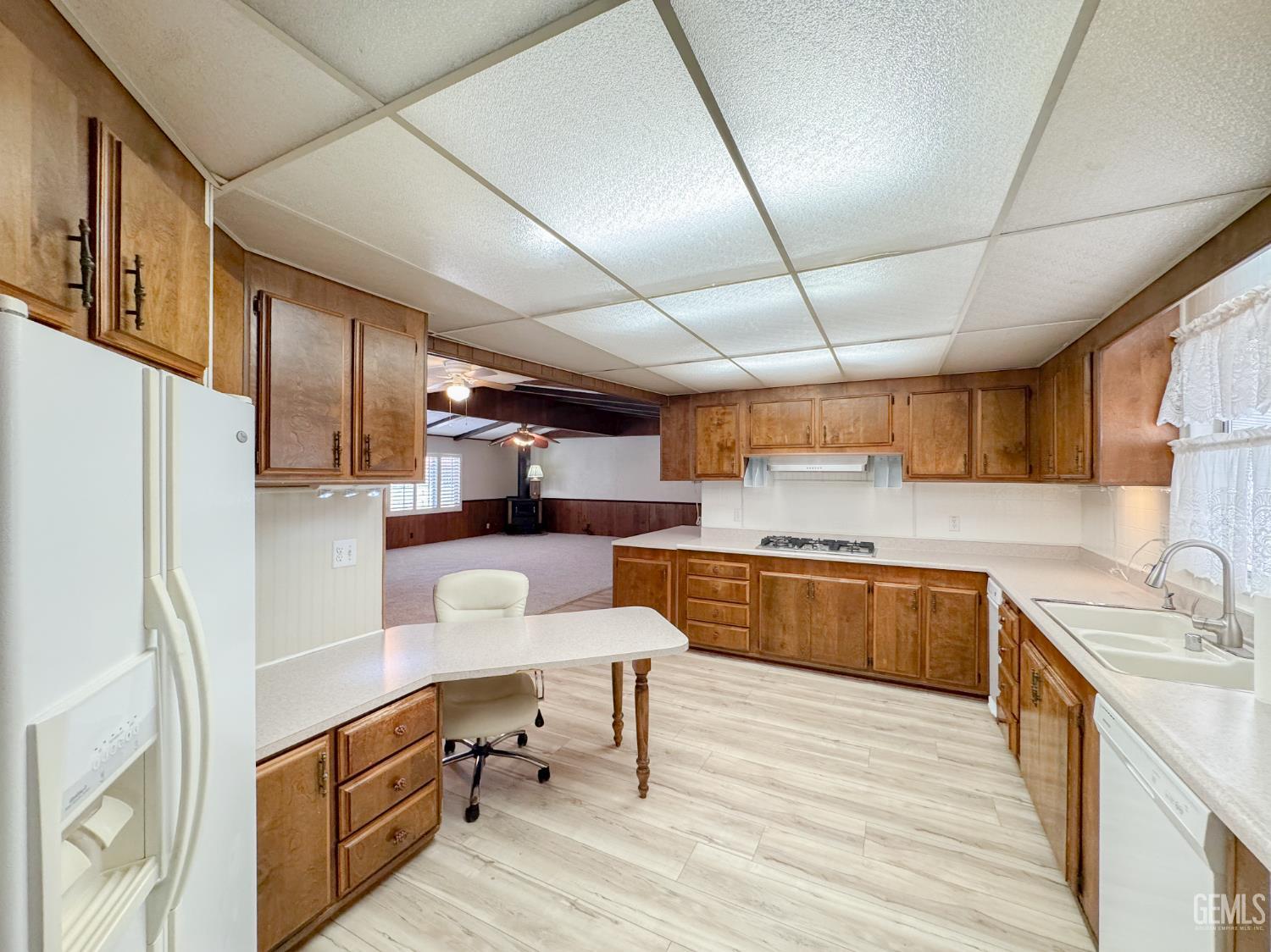 Undisclosed Address Bakersfield, CA 93306 - Photo 9 of 41 a kitchen with stainless steel appliances granite countertop a sink stove and refrigerator