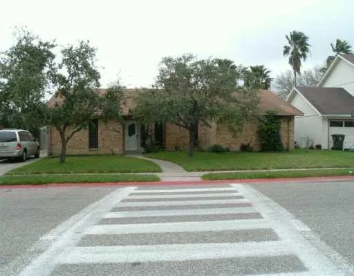 a view of house with yard