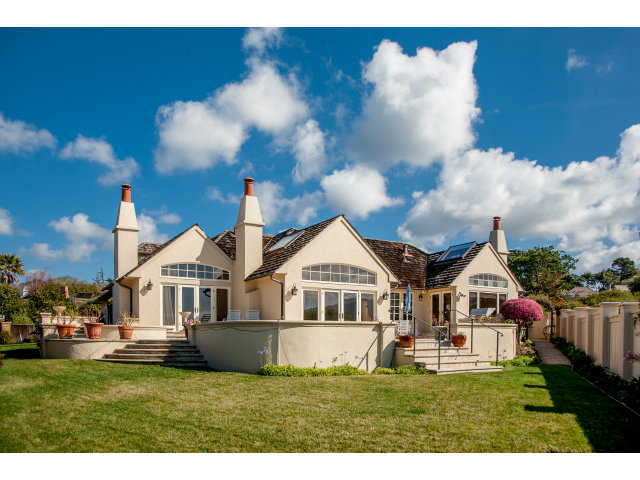 26156 Ladera Drive Carmel, CA 93923 - Photo 19 of 22 a view of a house with a big yard and potted plants