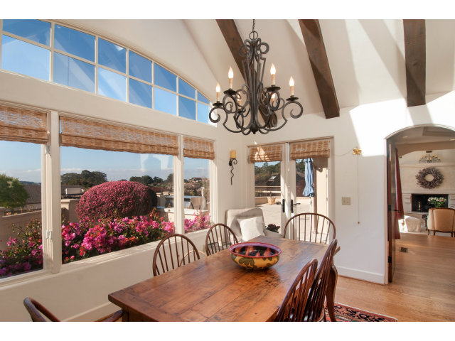 26156 Ladera Drive Carmel, CA 93923 - Photo 6 of 22 a view of a dining room with furniture and chandelier