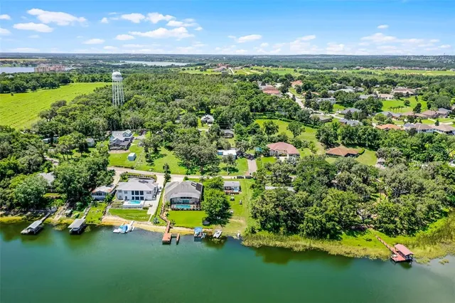 a view of a garden with houses