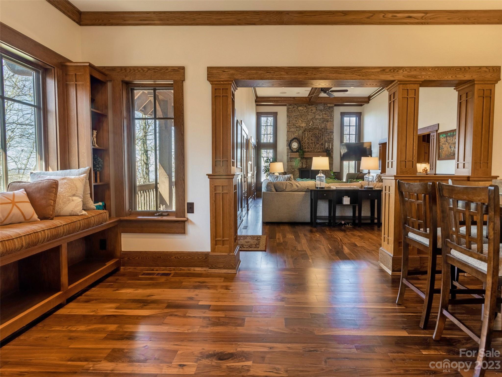 100 Boar Ridge Road Sylva, NC 28779 - Photo 11 of 48 a view of a living room and livingroom with furniture wooden floor and a large window