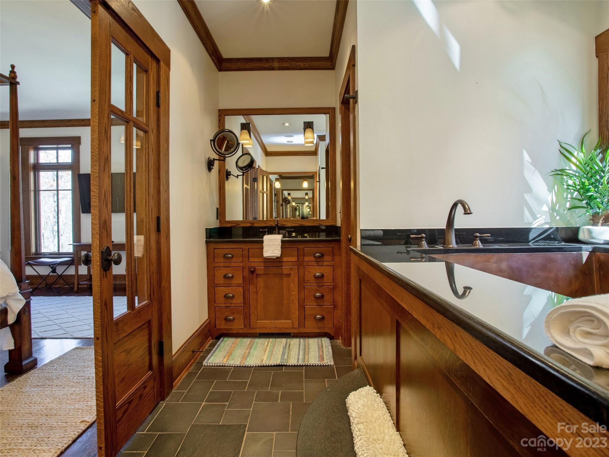 100 Boar Ridge Road Sylva, NC 28779 - Photo 20 of 48 a kitchen with a sink and cabinets