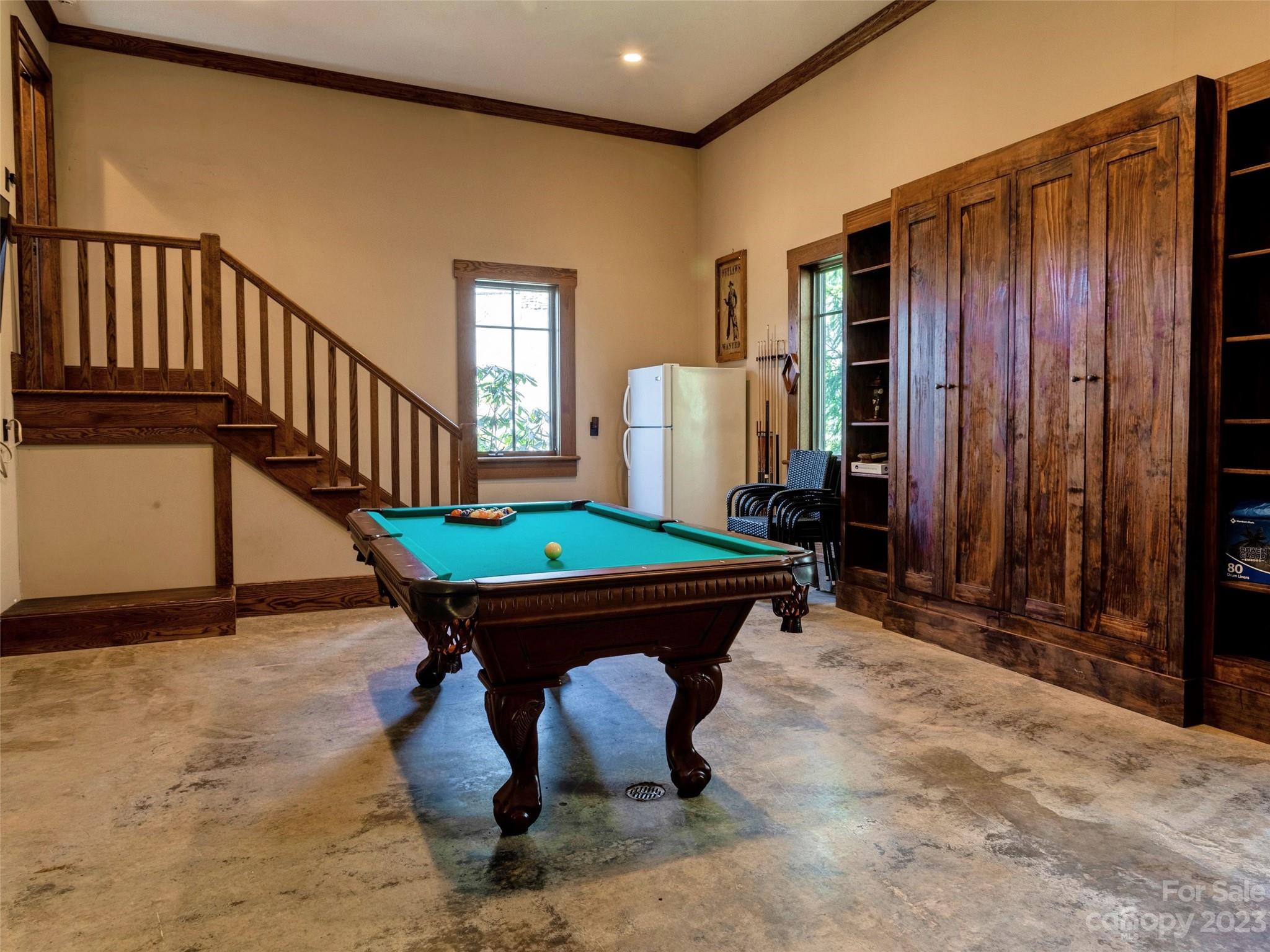 100 Boar Ridge Road Sylva, NC 28779 - Photo 29 of 48 a room with pool table and windows