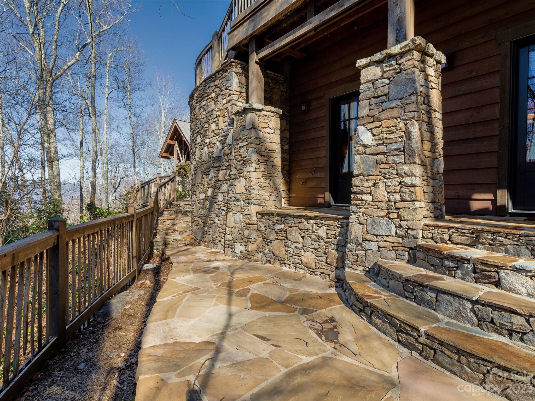 100 Boar Ridge Road Sylva, NC 28779 - Photo 36 of 48 a view of a pathway along the building