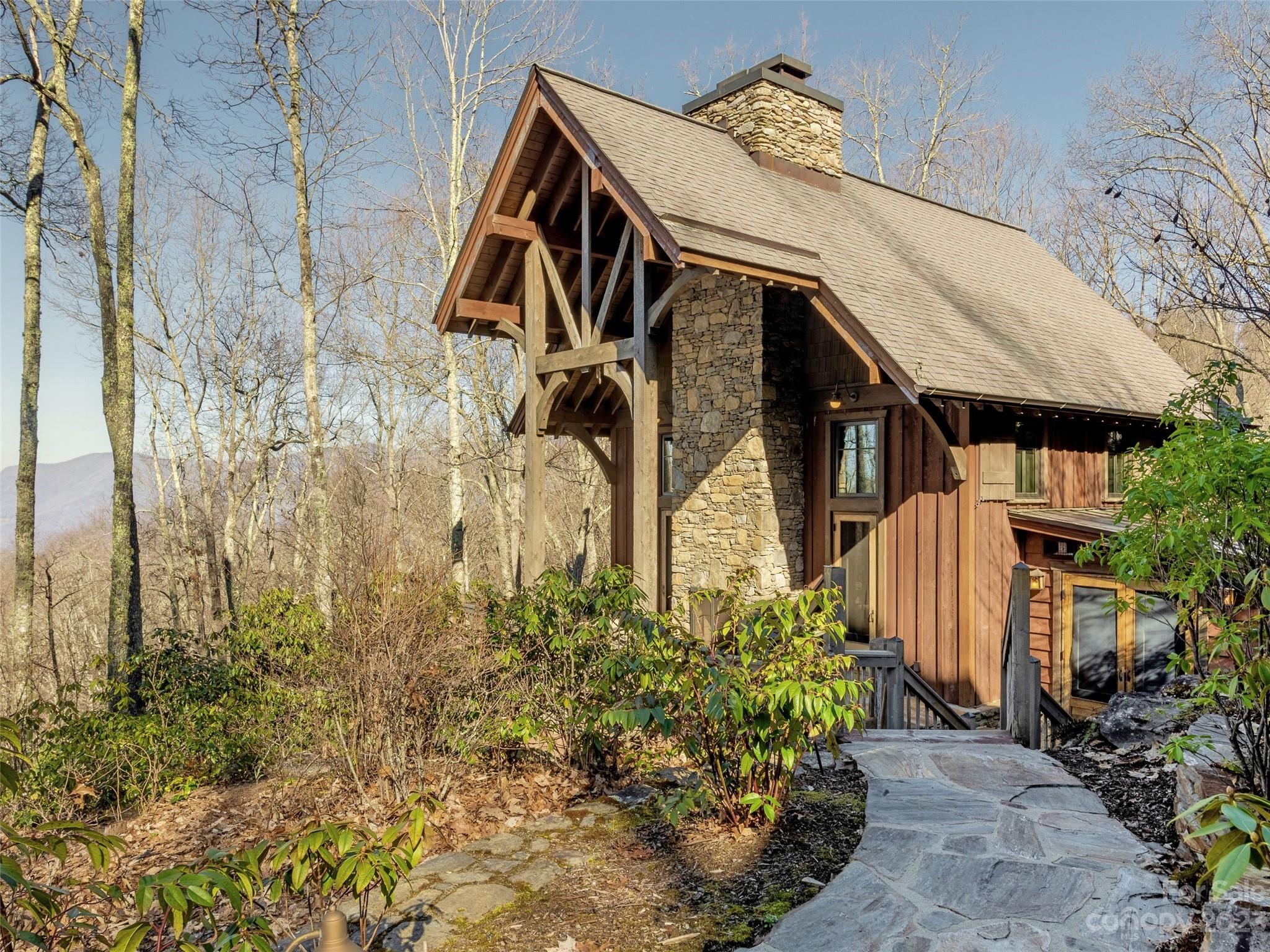 100 Boar Ridge Road Sylva, NC 28779 - Photo 38 of 48 a front view of a house with a yard