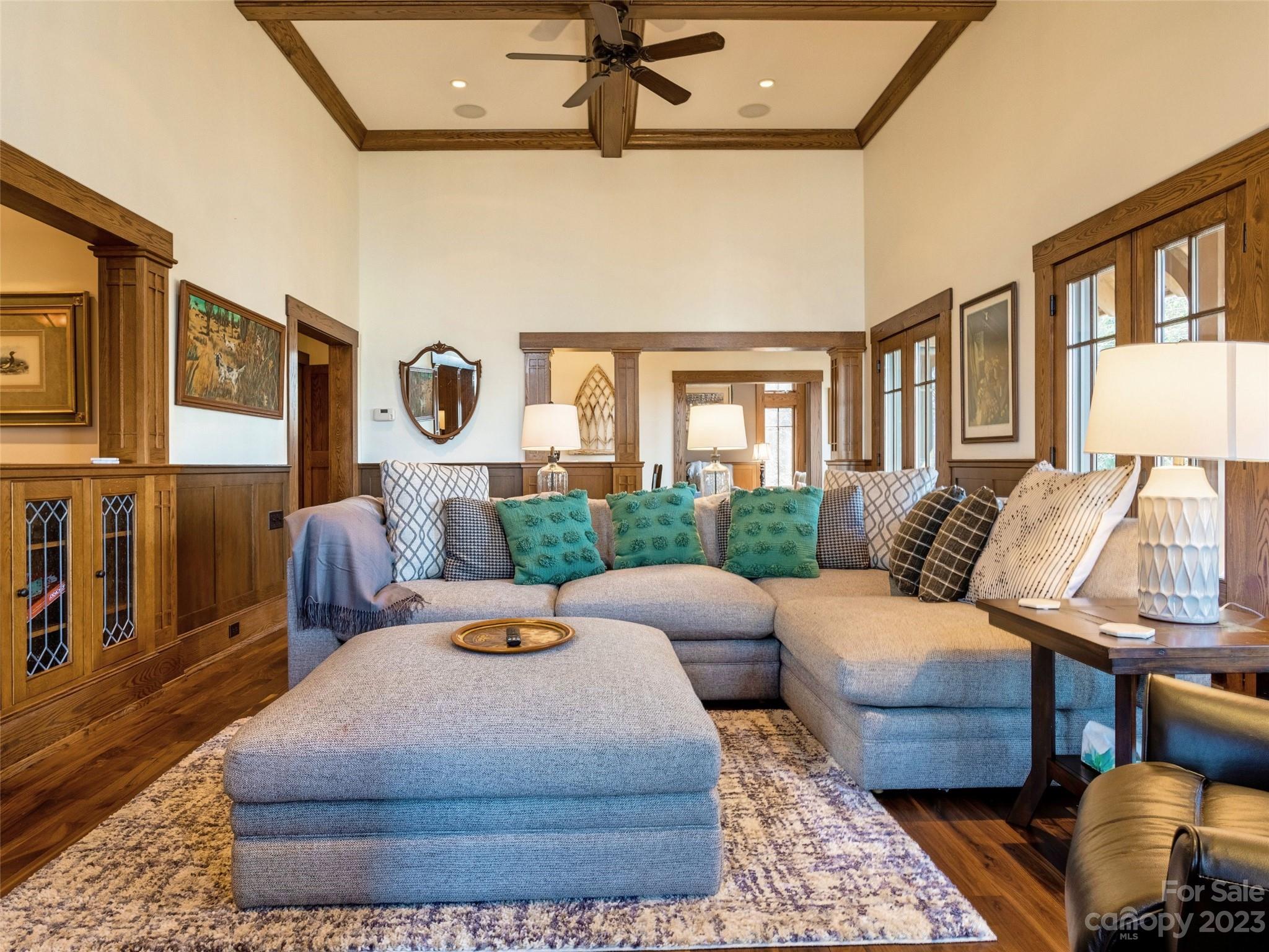 100 Boar Ridge Road Sylva, NC 28779 - Photo 5 of 48 a living room with furniture and wooden floor