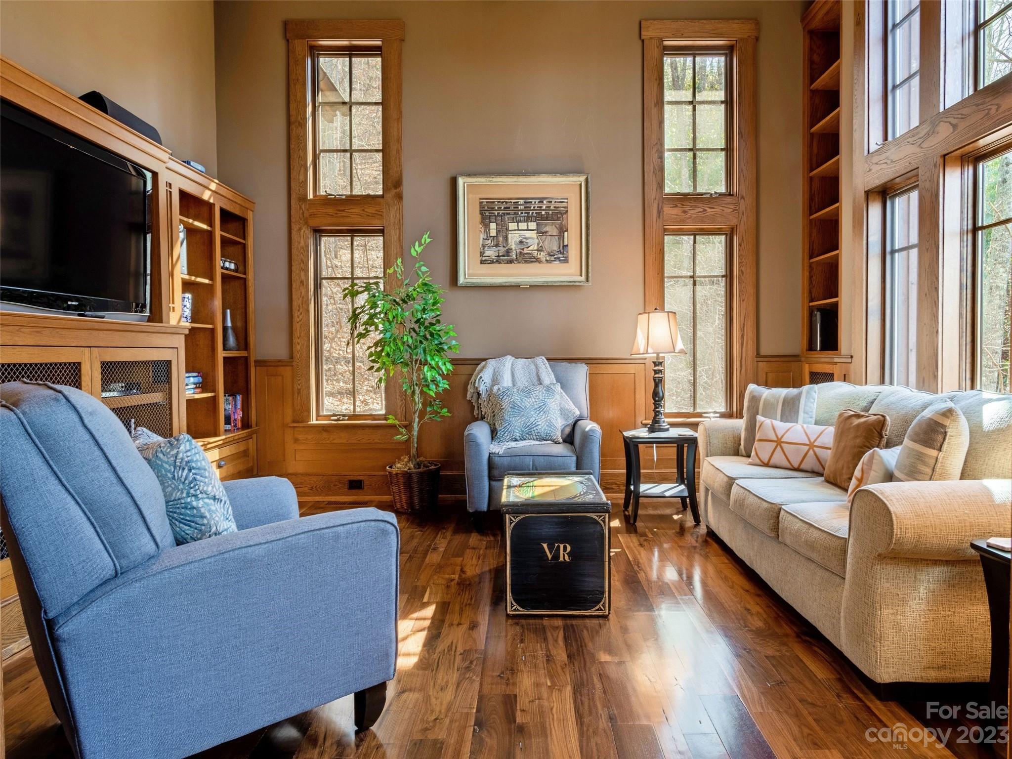 100 Boar Ridge Road Sylva, NC 28779 - Photo 9 of 48 a living room with fireplace furniture and a flat screen tv