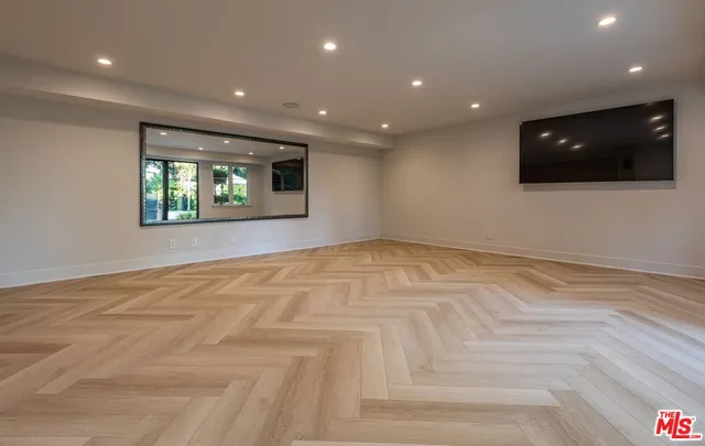 a view of a yard with swimming pool and sitting area