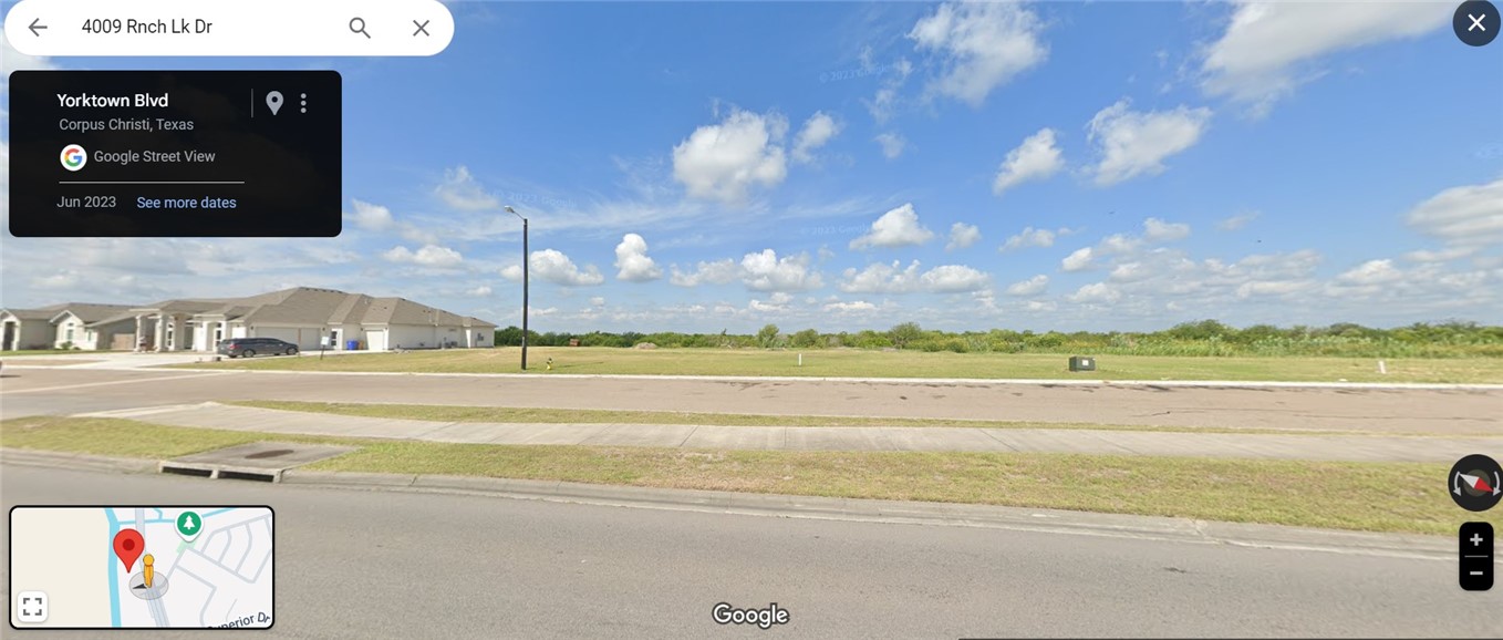 4009 Ranch Lake Drive Corpus Christi, TX 78413 - Photo 2 of 2 a view of an ocean and beach