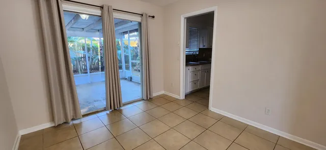 a view of a bathroom with mirror