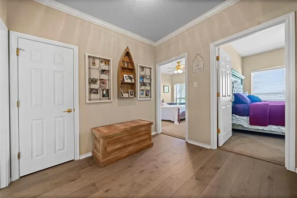 a kitchen with stainless steel appliances kitchen island wooden cabinets and a stove top oven