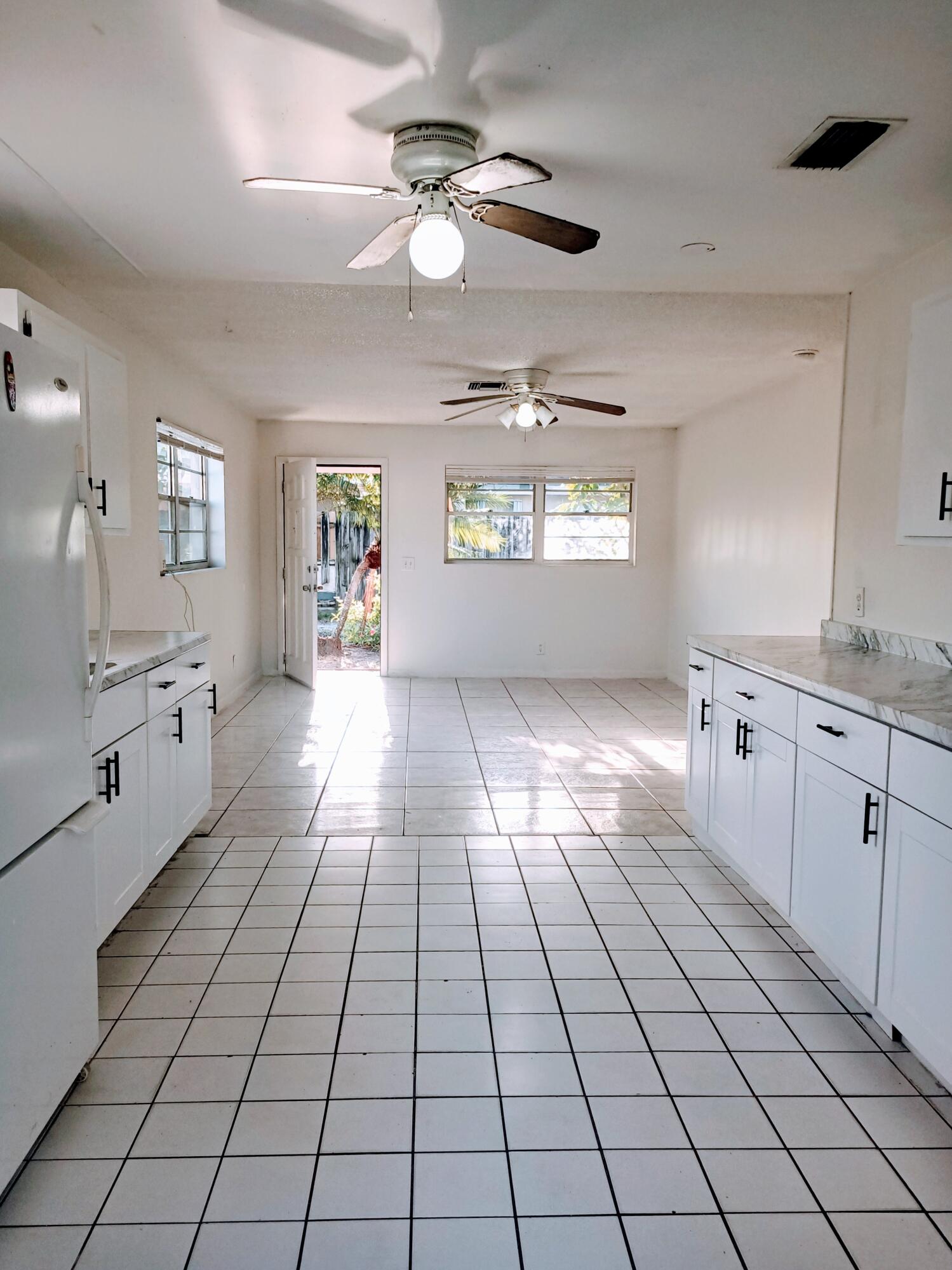 4034 Ruth Road Lake Worth, FL 33461 - Photo 5 of 12 kitchen/living