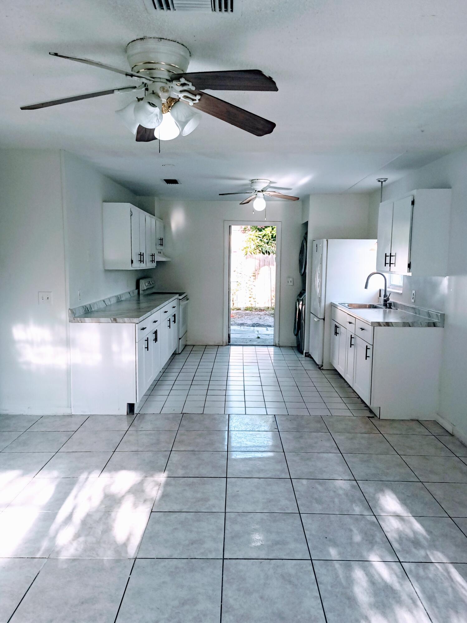 4034 Ruth Road Lake Worth, FL 33461 - Photo 6 of 12 living/kitchen