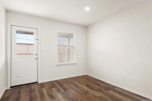 an empty room with windows