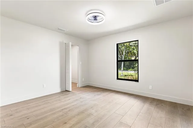 an empty room with a window