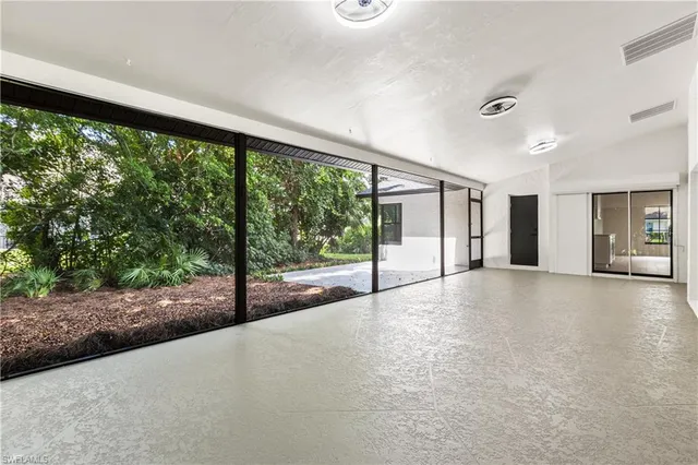 a view of a garden with an outdoor space