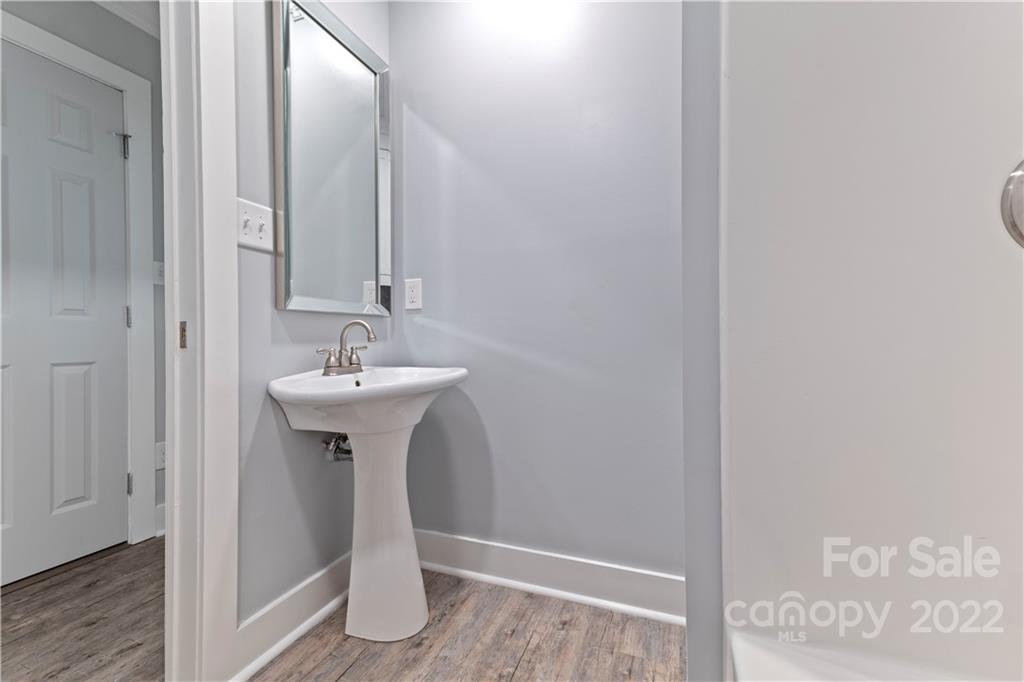 1248 West Shore Drive Lancaster, SC 29720 - Photo 12 of 27 a bathroom with a sink and a mirror