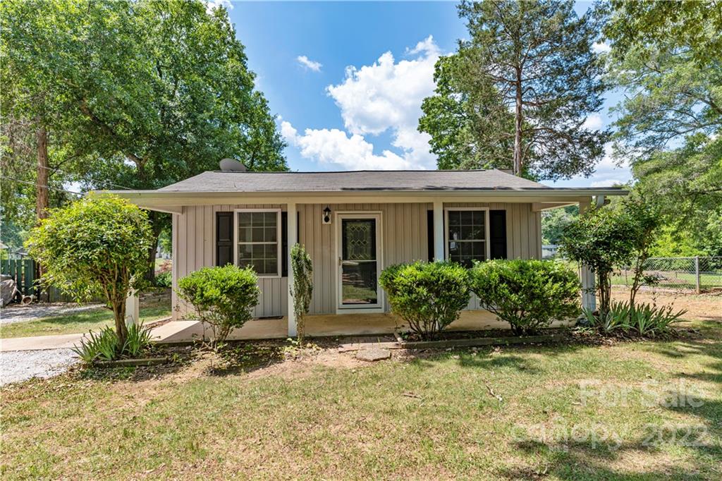1248 West Shore Drive Lancaster, SC 29720 - Photo 20 of 27 a front view of a house with garden