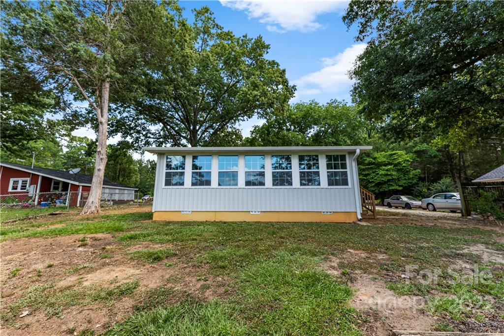 1248 West Shore Drive Lancaster, SC 29720 - Photo 21 of 27 a view of a house with a yard