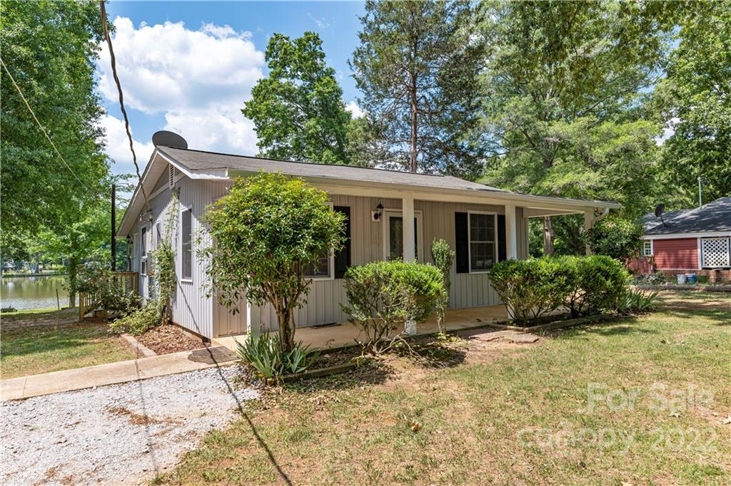 1248 West Shore Drive Lancaster, SC 29720 - Photo 22 of 27 a view of house with backyard and sitting area