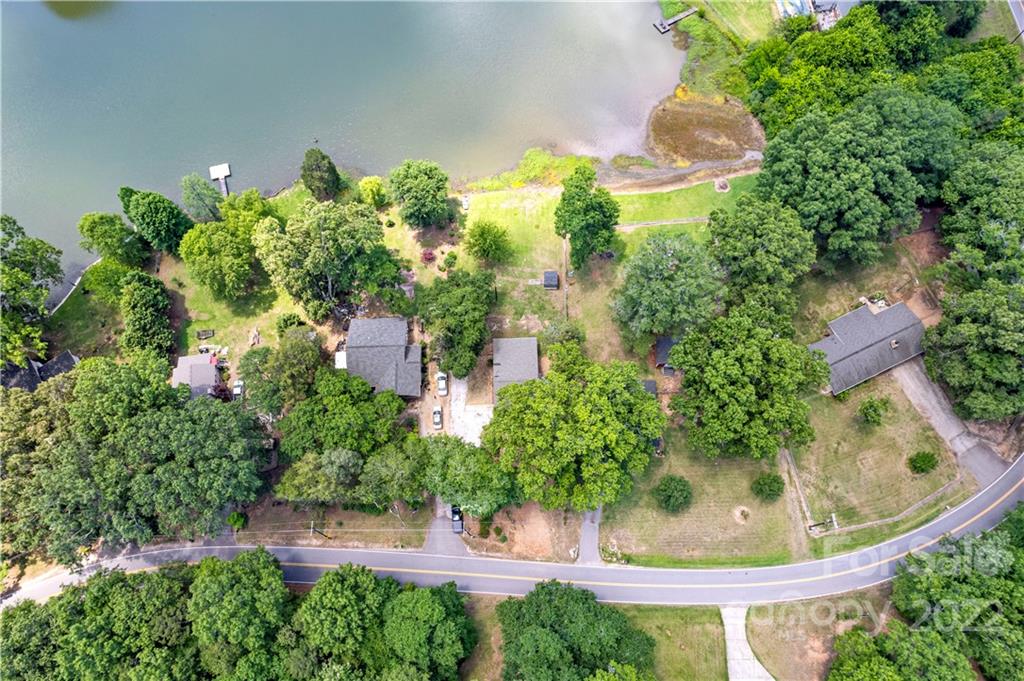 1248 West Shore Drive Lancaster, SC 29720 - Photo 25 of 27 a view of a garden with a fountain