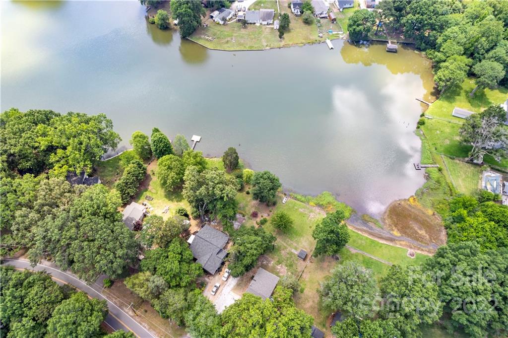 1248 West Shore Drive Lancaster, SC 29720 - Photo 26 of 27 an aerial view of a house with a yard and lake view