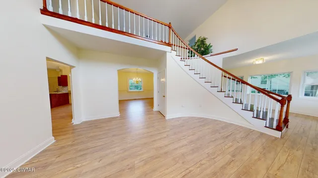 a view of entryway with wooden floor