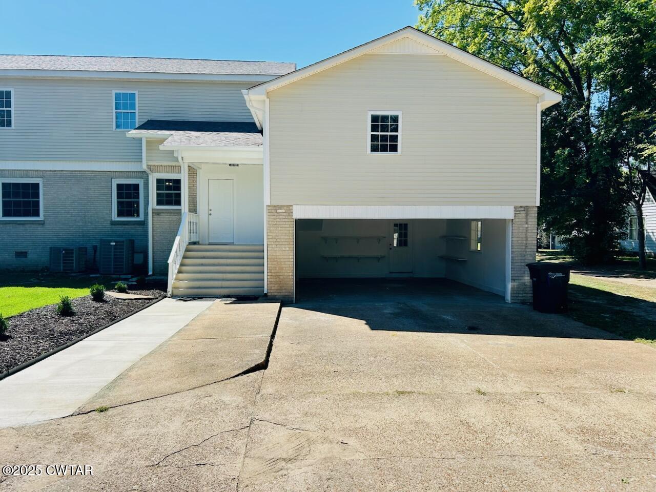 404 West Main Street Newbern, TN 38059 - Photo 35 of 35 a front view of a house with a yard